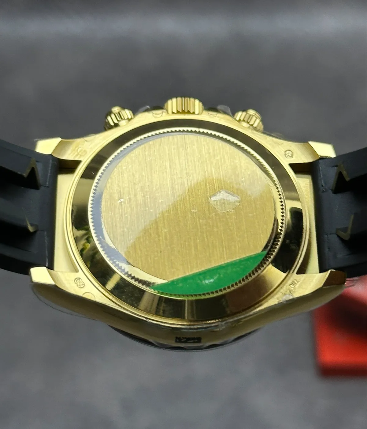 Detailed view of the Swiss replica movement in the Rolex Cosmograph Daytona M116518LN-0048