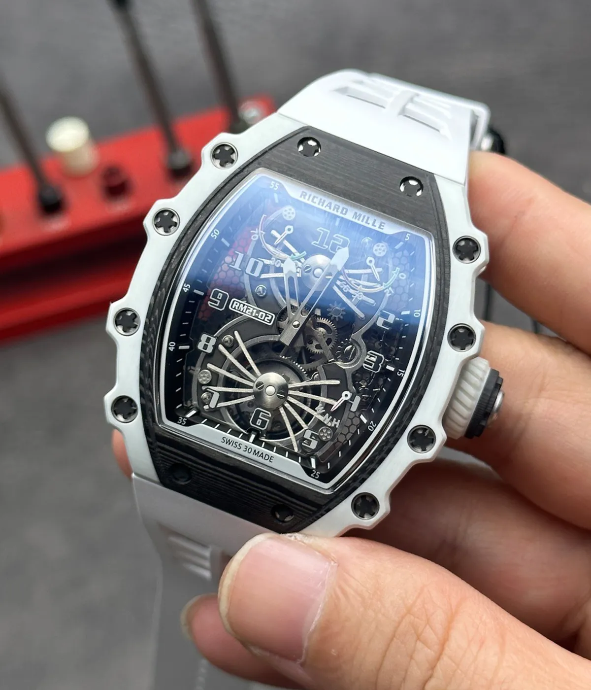 Close-up dial detail view of Richard Mille RM 21-01 Tourbillon replica watch showing tourbillon-style skeleton design