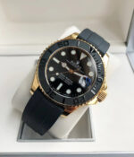 Rolex Yacht-Master M226658-0001 Black 45-degree angle view of Rolex Yacht-Master M226658-0001 replica watch showing black dial, gold-tone case, and rubber strap