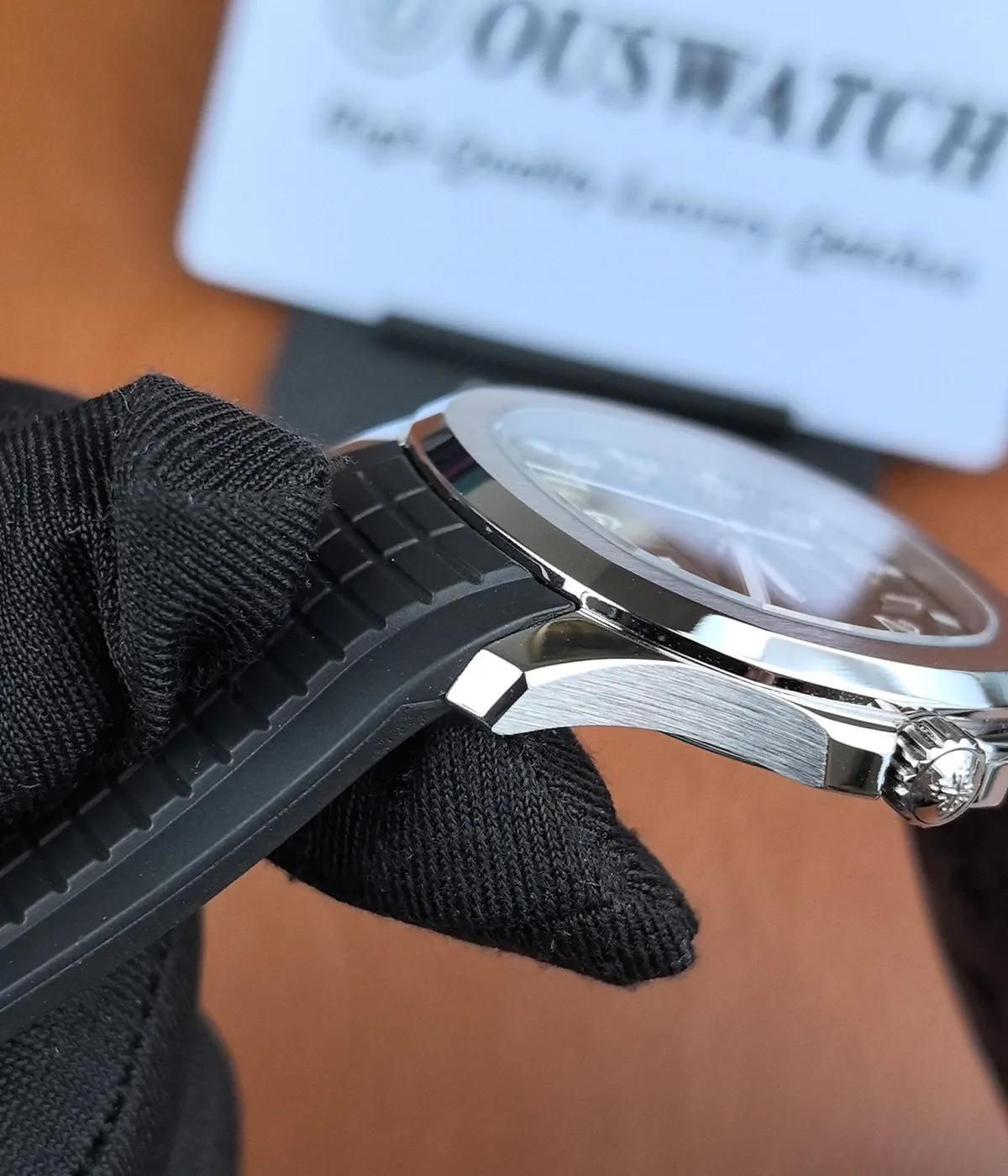 Detailed view of the lugs on Patek Philippe Aquanaut 5167A-001 replica watch showing polished and brushed finishes