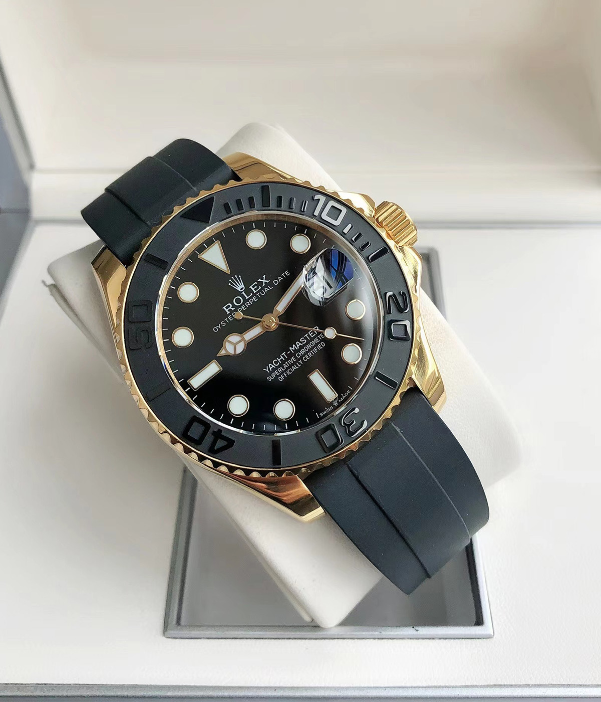 Negative 45-degree angle view of Rolex Yacht-Master M226658-0001 replica watch with black dial and rubber watch strap