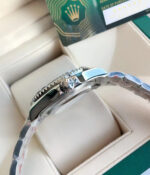 Close-up of Rolex Yacht-Master M126622-0001 replica watch crown and satin-finished case detail